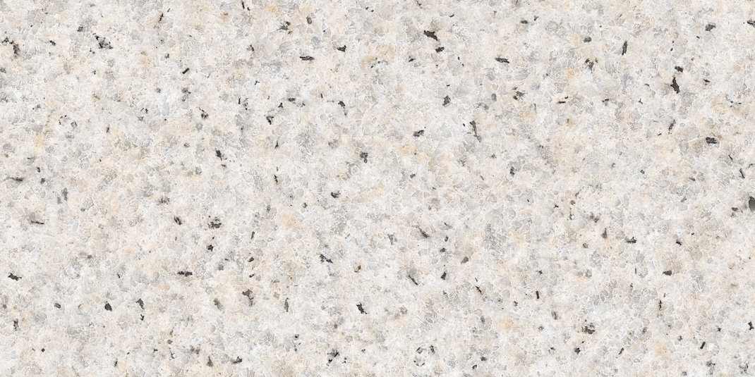 Granite Flat New White Sesame (светлый гранит с тонким зерном и мягким блеском)  гибкий камень 1200×600 мм