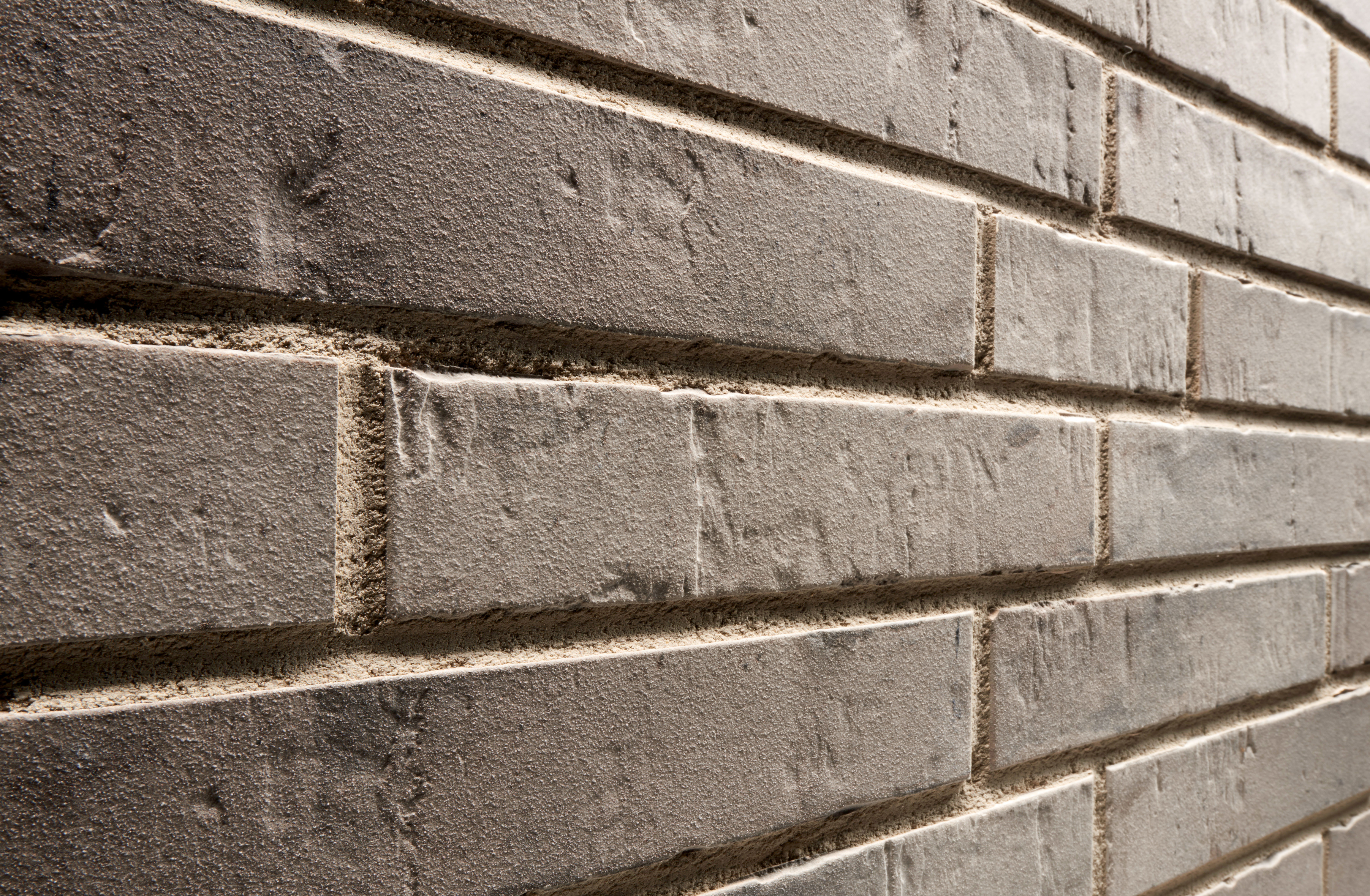 Клинкерная фасадная плитка облицовочная под кирпич Stroeher (Штроер) Kontur EG 472 grau engobiert рельефная, 240*52*12 мм