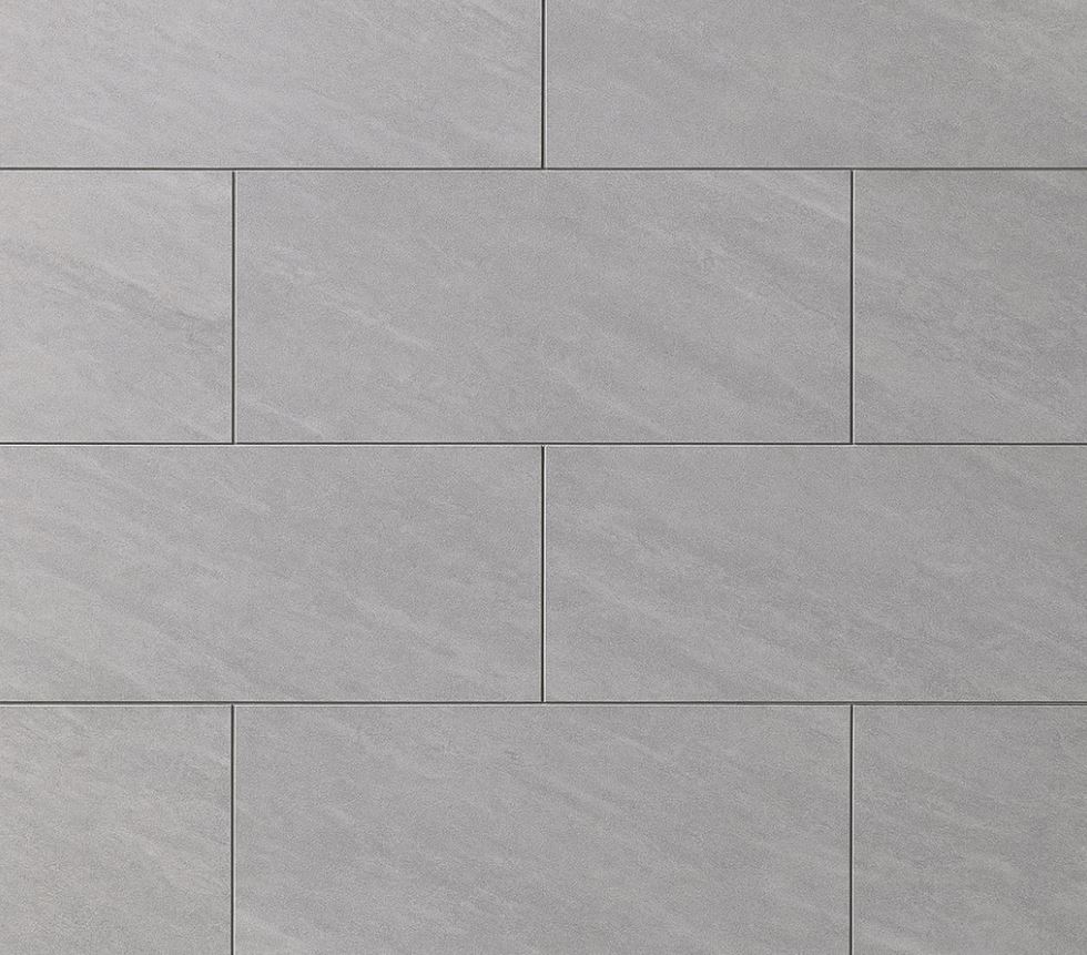 Крупноформатная фасадная плитка для цоколя и стен