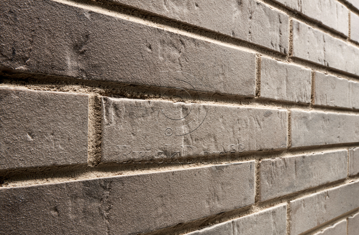 Клинкерная фасадная плитка облицовочная под кирпич Stroeher (Штроер) Kontur EG 472 grau engobiert рельефная, 440*52*12 мм